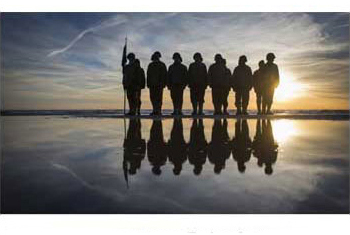 Heads Bowed, Flags Raised: World Leaders and Veterans Remember D-Day